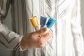 Woman holding bottles of colorful nail polishes, closeup Royalty Free Stock Photo