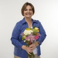 Woman holding bouquet. Royalty Free Stock Photo