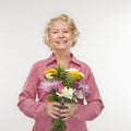 Woman holding bouquet. Royalty Free Stock Photo