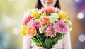 A woman is holding bouquet of flowers