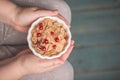 Woman holding bowl of tasty cereal corn flakes Royalty Free Stock Photo