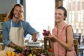 Woman holding a box of strawberries at the counter Royalty Free Stock Photo