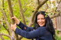 Woman holding branch tree