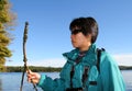 Woman Holding Branch of Zebra Mussels