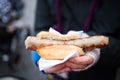 Woman holding bratwurst