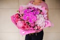 Woman holding bright pink bouquet Royalty Free Stock Photo