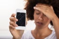 Woman Holding Broken Mobile Phone