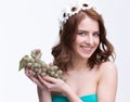 Woman holding bunch of grapesand Royalty Free Stock Photo