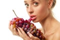 Woman holding a bunch of red grapes Royalty Free Stock Photo