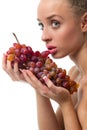 Woman holding a bunch of red grapes Royalty Free Stock Photo