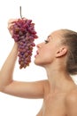 Woman holding a bunch of red grapes Royalty Free Stock Photo