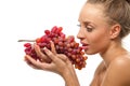 Woman holding a bunch of red grapes Royalty Free Stock Photo