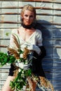 Woman holding bunch of wildflowers Royalty Free Stock Photo