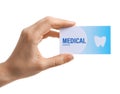 Woman holding business card  on white. Dental medical service Royalty Free Stock Photo
