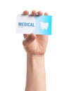 Woman holding business card on white, closeup. Dental medical service Royalty Free Stock Photo