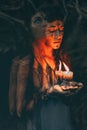 Woman holding candle in hands close up Royalty Free Stock Photo