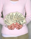 Woman holding cash Royalty Free Stock Photo