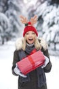 Woman holding Christmas gift Royalty Free Stock Photo
