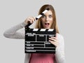 Woman holding a clapboard Royalty Free Stock Photo