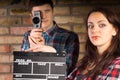 Woman holding a clapperboard Royalty Free Stock Photo