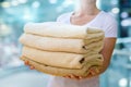 Woman holding clean towels. Royalty Free Stock Photo