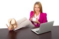 Woman holding coffee in the office with laptop Royalty Free Stock Photo
