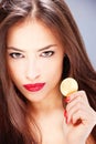 Woman holding coin, ducat Royalty Free Stock Photo