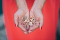 Woman holding colorful hearts