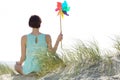 Woman holding colorful pinwheel Royalty Free Stock Photo