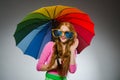 Woman holding colourful umbrella Royalty Free Stock Photo
