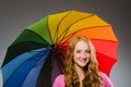 Woman holding colourful umbrella Royalty Free Stock Photo