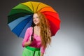 Woman holding colourful umbrella Royalty Free Stock Photo