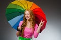 Woman holding colourful umbrella Royalty Free Stock Photo