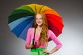 Woman holding colourful umbrella Royalty Free Stock Photo