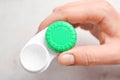 Woman holding contact lens case Royalty Free Stock Photo