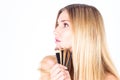 Woman is holding cosmetic brushes. Make-up Royalty Free Stock Photo