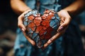 A woman holding a cracked broken heart in her hands, AI