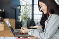 Woman holding credit card and using laptop and smartphone shopping website online, shopping concept Royalty Free Stock Photo