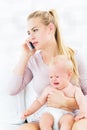 Woman holding crying baby