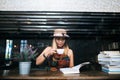 Woman is holding a cup of hot cappuccino and reading a book, Business woman read a book Royalty Free Stock Photo