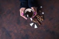 Woman holding cup of hot chocolate.