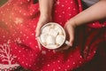 Woman Holding Cup of Hot Tasty C hocolate with Marshmellow Red Christmas Blanket Cozy Christmas Concept Woman Having a Cup of Coco