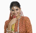 Woman holding a Dandiya at Navratri