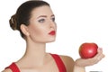 Woman holding a dark red Apple. healthy eating