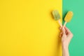 Woman holding delicious ice pops on color background, top view with space for text. Fruit popsicle Royalty Free Stock Photo