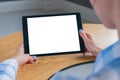 Woman holding digital tablet device with white blank screen - mockup image Royalty Free Stock Photo