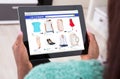 Woman Doing Online Shopping On Digital Tablet