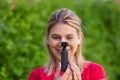 Woman holding DJI Osmo Camera