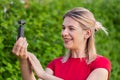 Woman holding DJI Osmo Camera