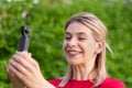 Woman holding DJI Osmo Camera